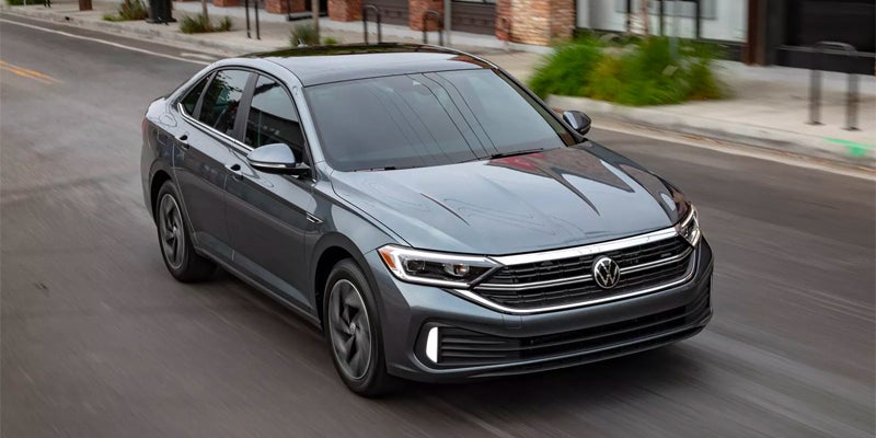 2024 Volkswagen Jetta driving in a city